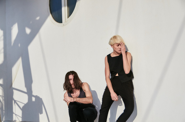 fashion man and girl in a black clothes - Photo, Image
