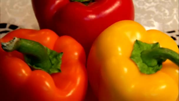 Red, Yellow and Orange Bell Peppers Rotating in front of Camera
 - Кадры, видео