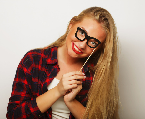 Party image.Young woman holding a party glasses. - Foto, imagen