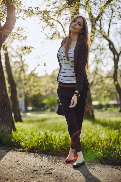 Woman wearing casual clothes in garden - Fotografie, Obrázek