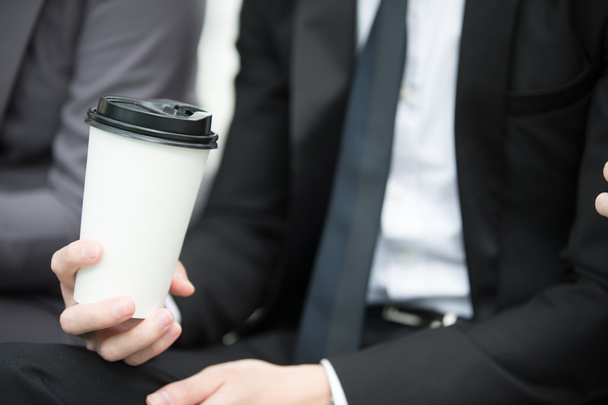 businessman holding coffee - Φωτογραφία, εικόνα