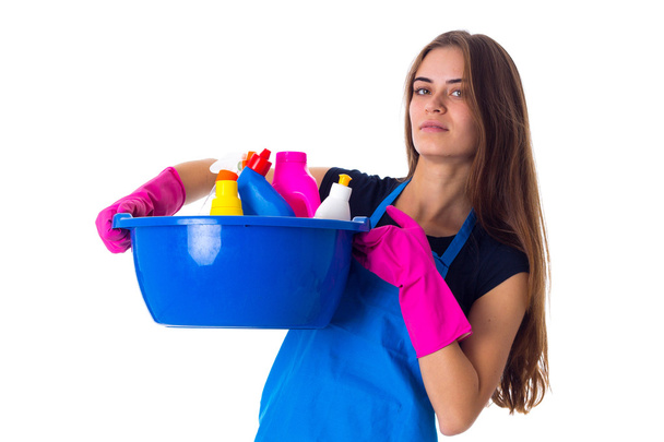 Woman holding cleaning things in washbowl - Fotografie, Obrázek