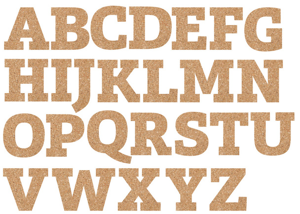 carved cork alphabet letters isolated on white - Foto, imagen