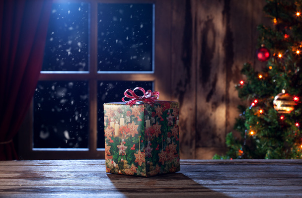  box with Christmas present on color back - Photo, Image