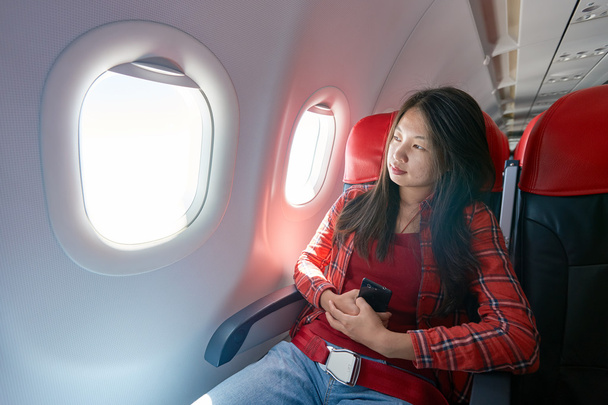 woman inside of aircraft - Foto, Imagen