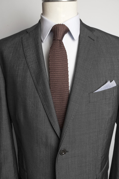 jaqueta masculina taylored. Em um manequim. tecido cinzento
 - Foto, Imagem