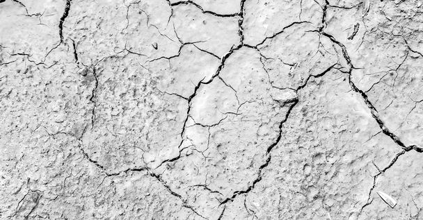  la textura abstracta de arena agrietada
 - Foto, imagen