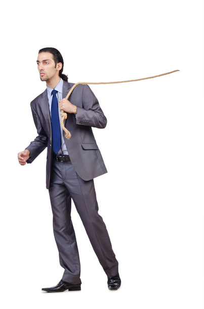 Businessman pulling rope on white - Foto, imagen
