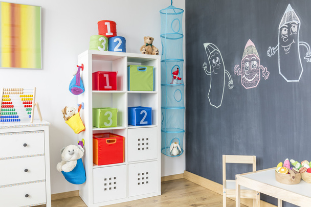 Child room with cabinet table - Foto, Bild