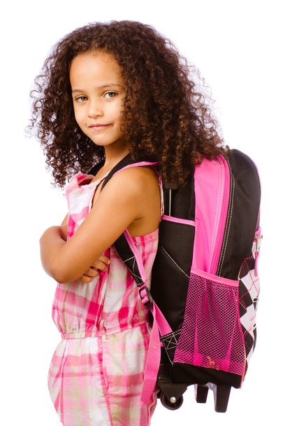 Mixed race African American girl wearing backpack for school against white background - Photo, Image