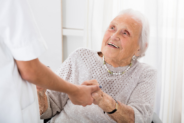 Senior Patient Holding Hands Of Doctor - Fotografie, Obrázek