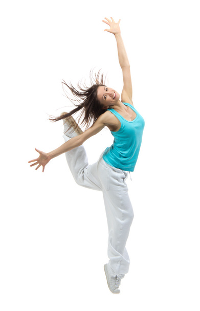 Modern slim hip-hop style teenage girl jumping dancing - Foto, afbeelding