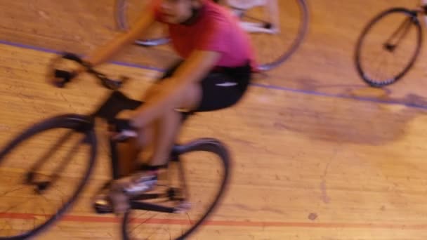 competitive cyclists racing on track - Footage, Video