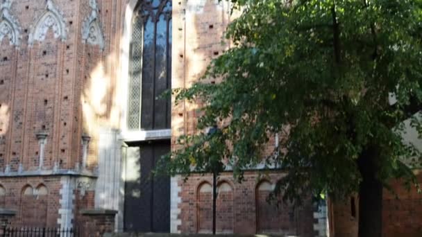 Church of St. John Baptist and St. John Evangelist, Minor Basilica, Cathedral of Torun Diocese, Poland. Gothic church, built from brick, an aisled hall with monumental west tower. - Footage, Video