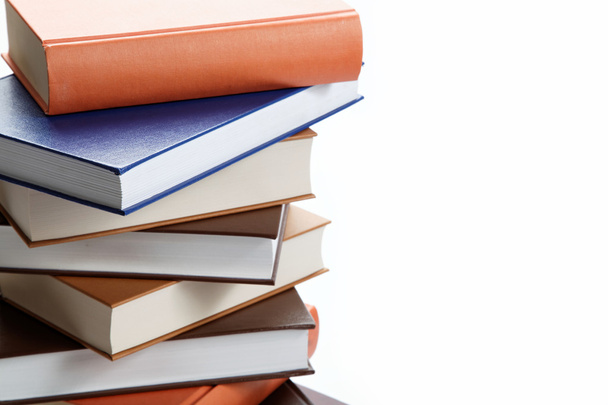 A stack of books on a white background. - Photo, Image