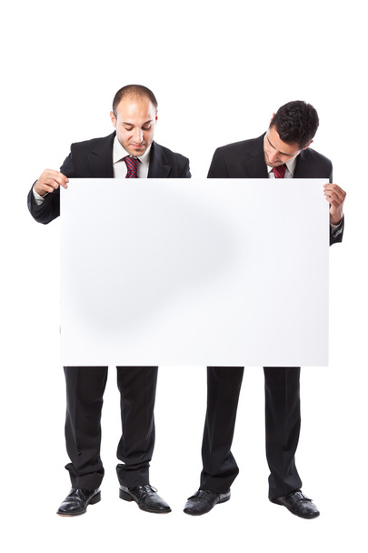 Two Businessman holding a billboard - Foto, afbeelding