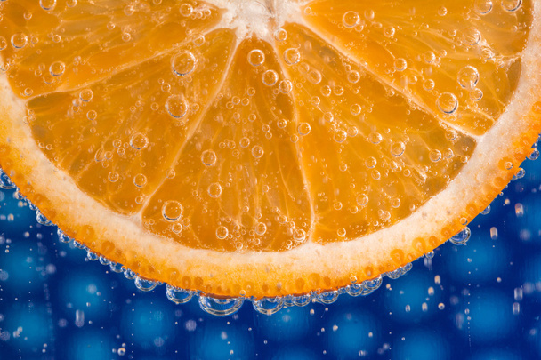 Orange slice in bubbles - Photo, Image