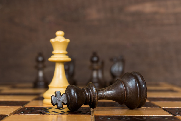 Chess photographed on a chessboard - Φωτογραφία, εικόνα