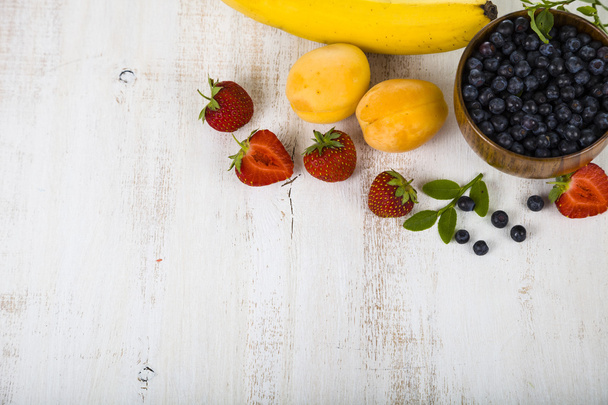 Fruits on a wooden table - Photo, Image
