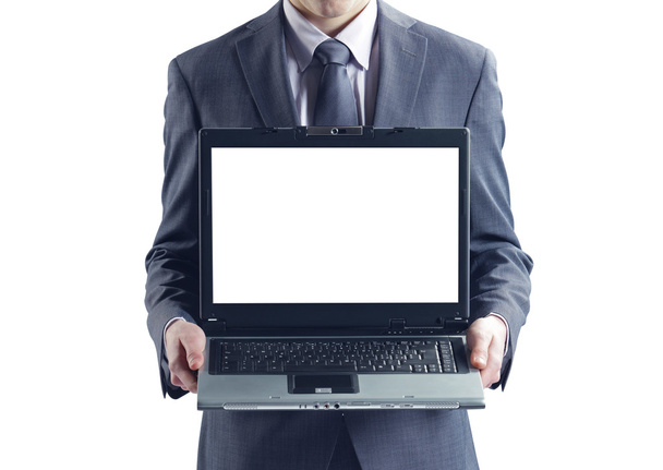 Businessman holding his laptop - Photo, Image