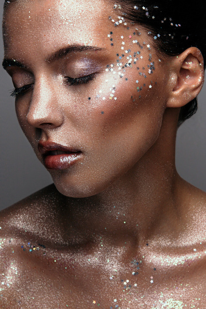 Girl with fashion glitter makeup with sequins - Valokuva, kuva