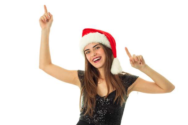portrait of cheerful lovely woman in santa hat - Фото, зображення