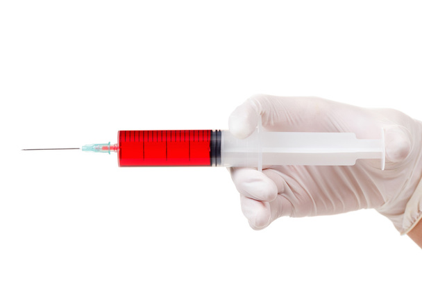 Doctor hand with medical syringe, ready for injection isolated on white - Φωτογραφία, εικόνα