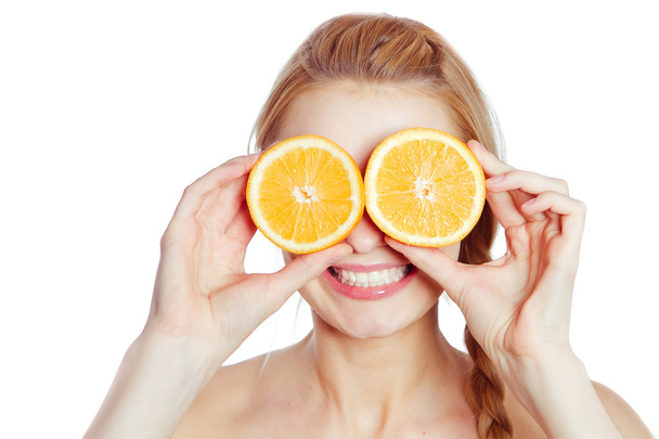 Young woman with oranges - Foto, Imagem