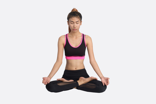 Young woman in yoga pose. - Φωτογραφία, εικόνα