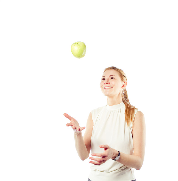 Smiling business woman with green apple - Zdjęcie, obraz