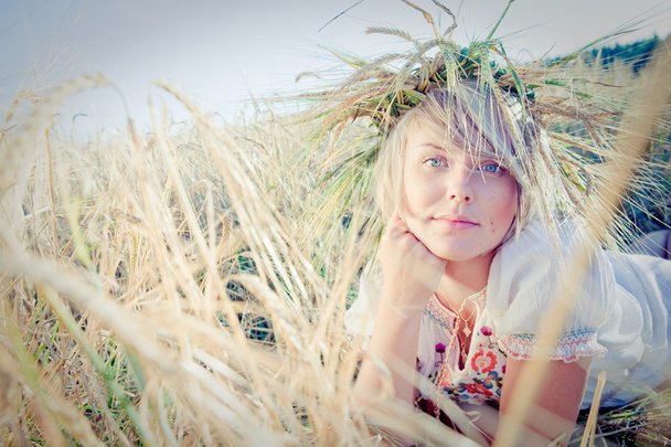Image of young woman on wheat field - Photo, image