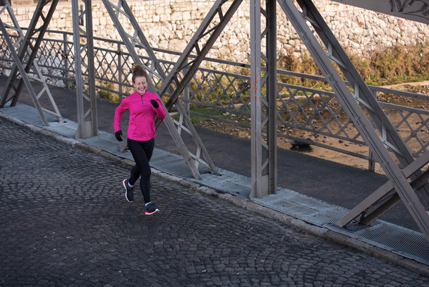 sporty woman jogging on morning - Φωτογραφία, εικόνα