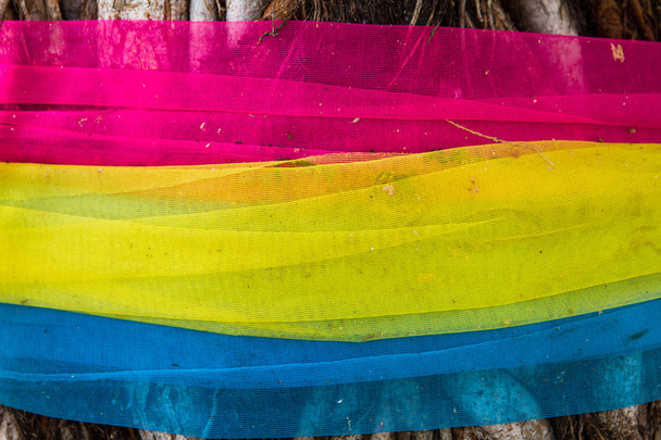 Thaise stijl drie kleur stof stropdas met boom, drie kleuren kleden - Foto, afbeelding