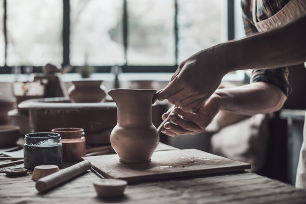 potter making ceramic jug - Foto, Imagem