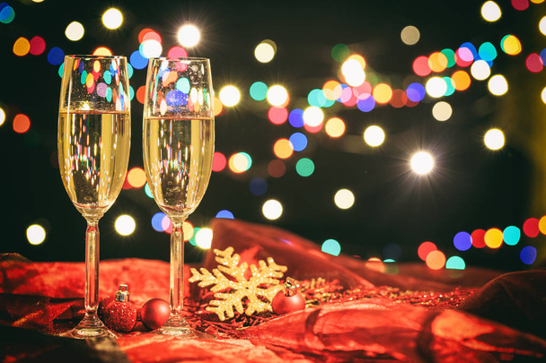 Glasses of champagne and christmas decoration - Photo, Image