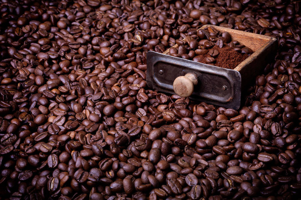 drawer from coffee grinder full of caffee beans and powder - Foto, imagen