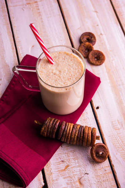 anjeer milk shake or fig milk shake, health drink with dried figs, selective focus - Photo, Image