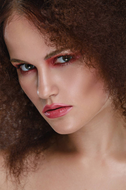 Beauty closeup portrait of young caucasian girl. Woman looking at camera. Beautiful fashion luxury makeup. - Foto, Imagem