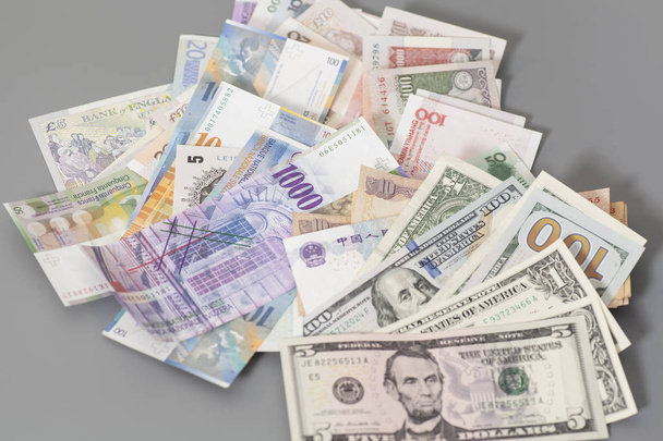 International currencies isolated on gray backgrond - Фото, зображення