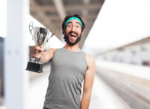 happy sport man with sport cup - Foto, Imagen