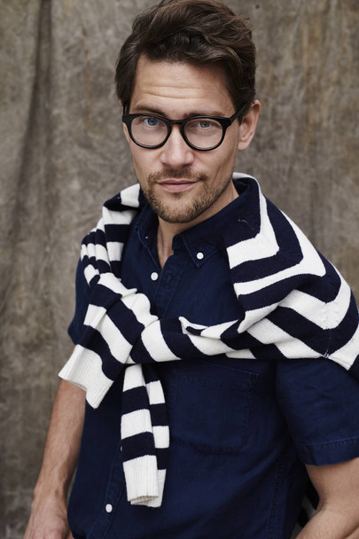 Man wearing striped sweater - Foto, Imagen