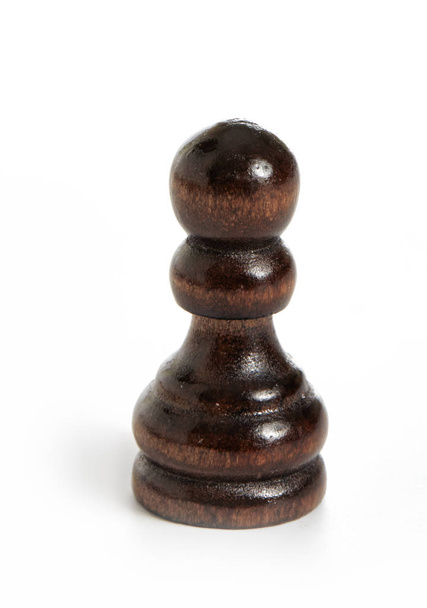 Wooden pawn brown chess piece black - Photo, Image