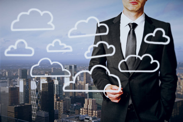Businessman drawing cloud icons - Foto, Imagen