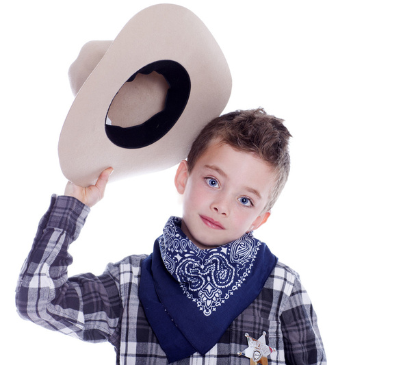 Young boy dressed as a cowboy - Фото, изображение