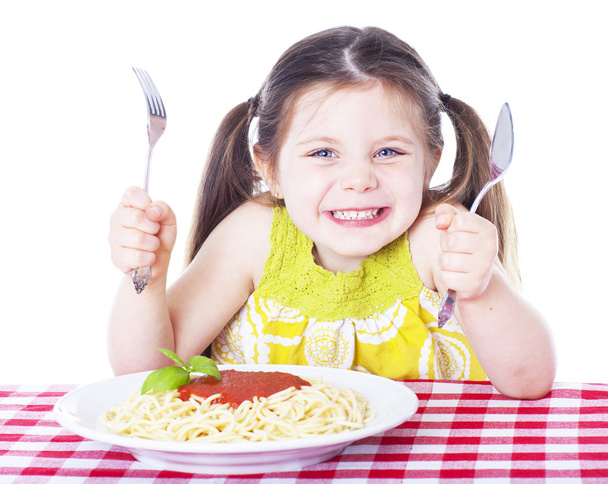Beautiful girl eating pasta - Photo, Image