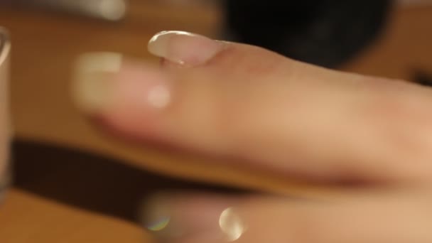 Master makes the girl manicure hands at salon - Felvétel, videó