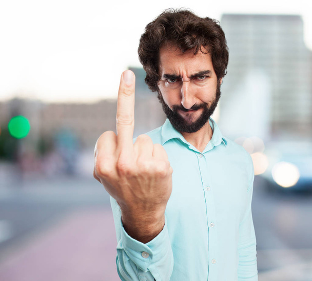 angry young man with disagree sign - Foto, imagen