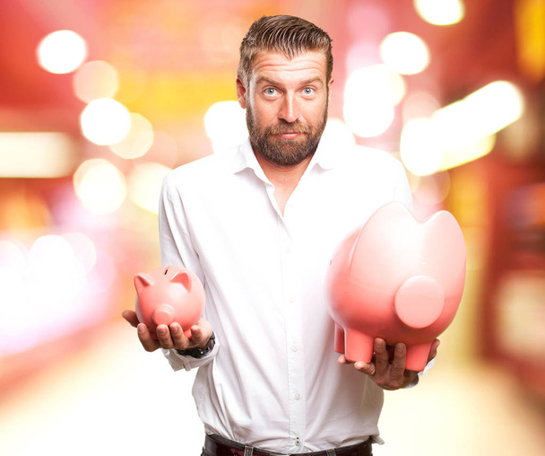 happy young man with piggy bank - Photo, Image