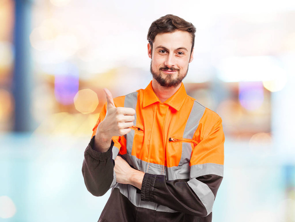 happy worker man with okay sign - Фото, изображение