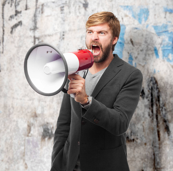 angry businessman with megaphone - Foto, Imagen